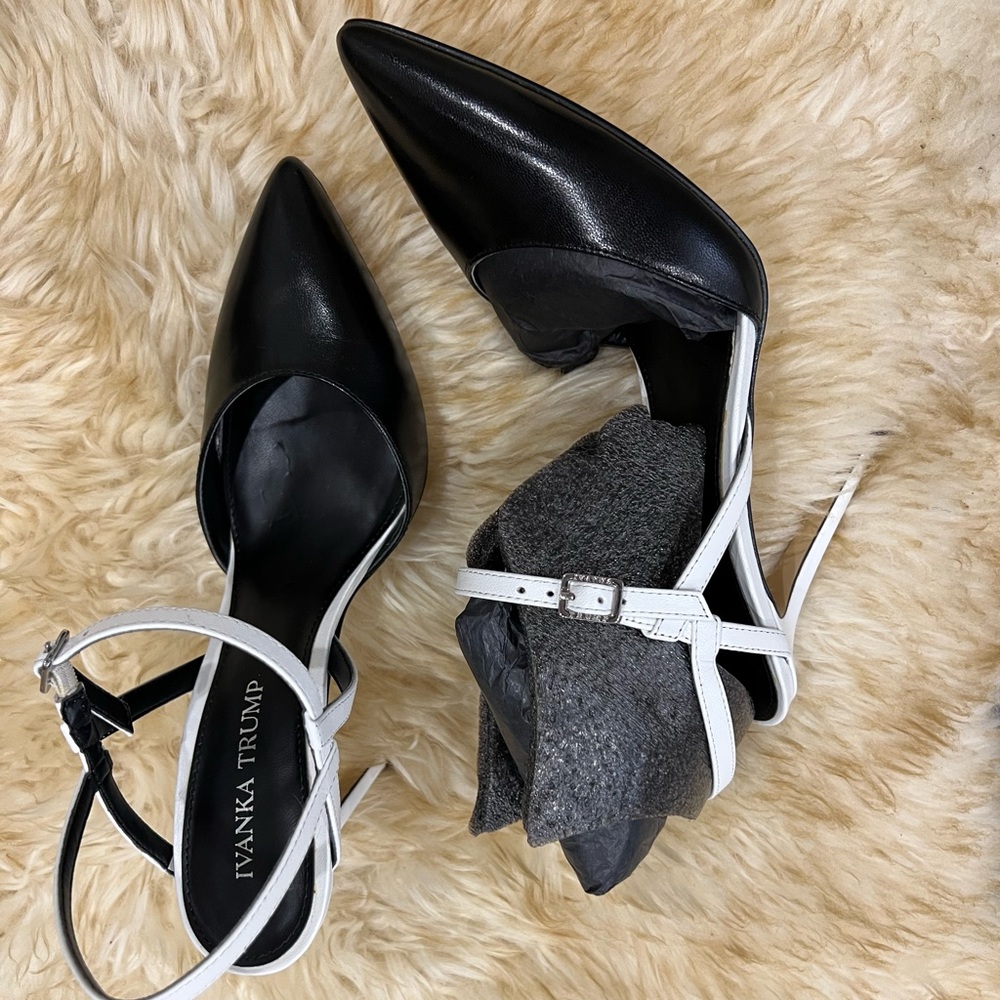 Unworn black and white heals.
